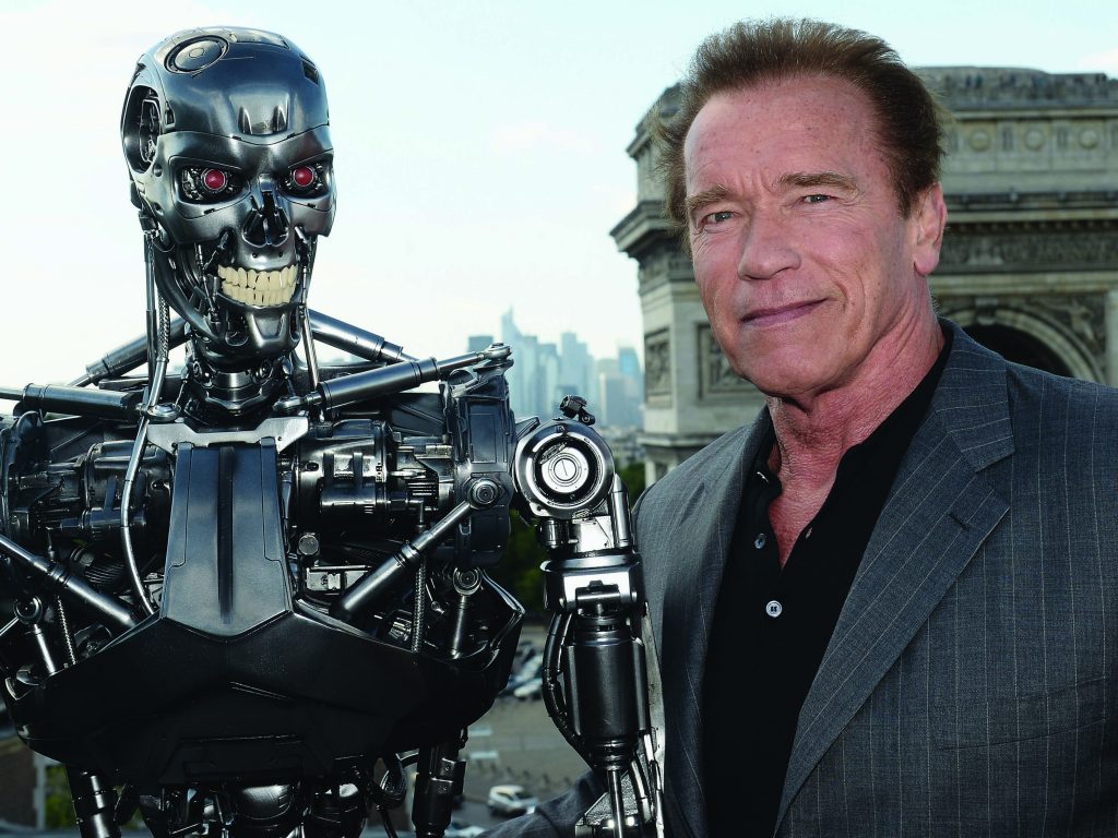 PARIS, FRANCE - JUNE 19:  Actor Arnold Schwarzenegger poses with Endoskeleton during the France Photocall of 'Terminator Genisys' at the Publicis Champs Elysees on June 19, 2015 in Paris, France.  (Photo by Dominique Charriau/Dominique Charriau/Getty Images for Paramount Pictures) *** Local Caption *** Arnold Schwarzenegger