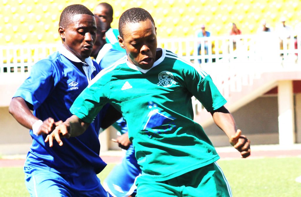 Matlama defender khotso Molulela (behind) closing in Linare player in League match played at Setsoto last Friday