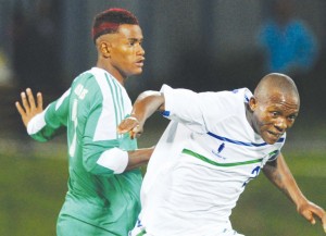 MAFA Moremoholo of Lesotho, right, is fouled by Islahi Mmadi of Comores during the Cosafa Under-20 Youth Championship tie in Group A game between Lesotho and Comoros at Setsoto Stadium on Tuesday