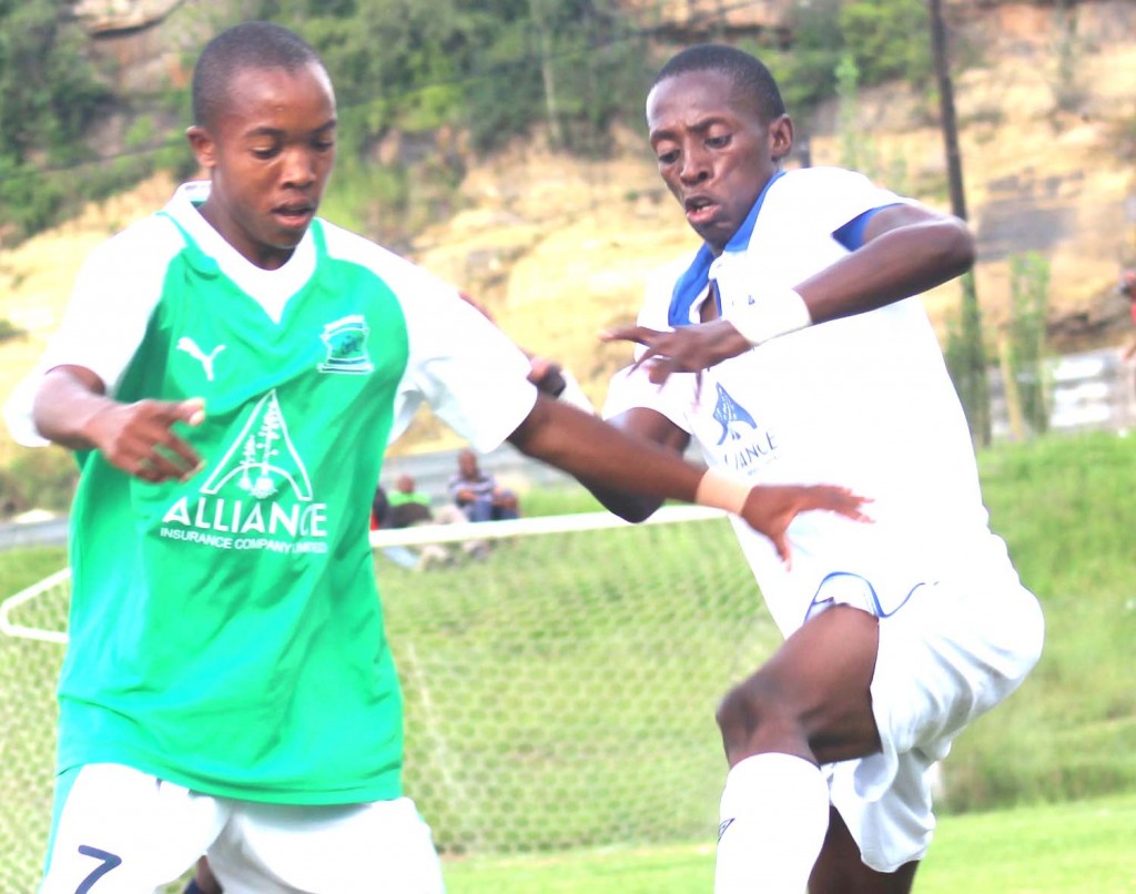 LCS  right wingerThetso Poshuli ,left, fight for the ball with Matlama player maker Phafa Ts'osane,right, on Wednesday at LCS Ground during VCL Premier Leaque tie