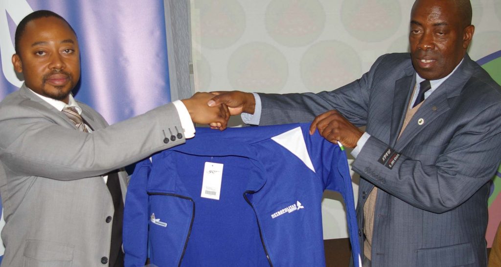 Metropolitan Lesotho Communications and Marketing Manager, Tšokolo Makeka hand over  a new kit to Lesotho Volleyball Association President, William Nhlapho 