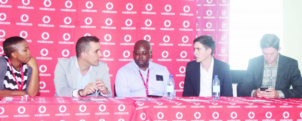 VCL Marketing and Brand Manager Ketsia Matsela, Acting MD Johnny Dos Santos, Manager M-Pesa Eco-system Dev Tsepo Thabisi with  Mukuru Lead Business Developer Oliver O' Brien and Jon Luis Burke