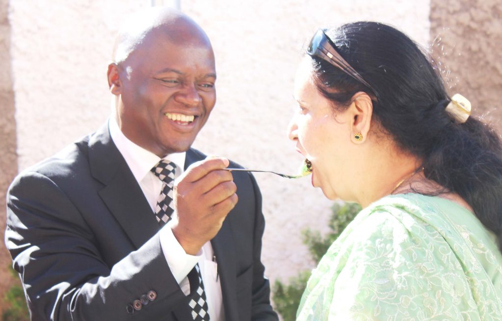 Mr Sekhamane shares the cake with Mrs Bakaya