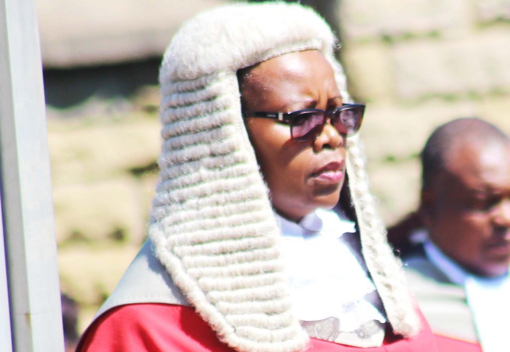 Her Lordship Chief Justice Nthomeng Majara inpects the guard of Hounor on Monday during the opening of the High Court 