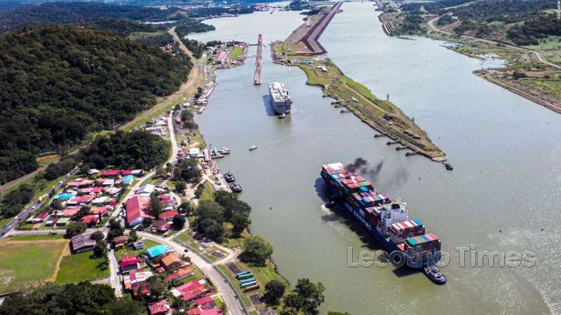 Container ship transiting the Panama Canal during low-water conditions